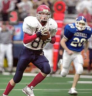 Zach Vredenburgh races toward the end zone for his first of two touchdowns Saturday in Chenango Forks' 12-7 victory over Westhill in the state quarterfinals. Vredenburgh's 42-yard TD catch in the final minute was the deciding score