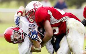 CV's John Cirba tackles the Blue Devils' Jason Chier during Saturday's game at Chenango Valley High School.