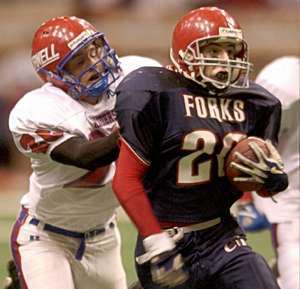 Forks' Tim O'Branski tries to outdistance Hornell's Kirk Luvison in the fourth quarter Friday in the Carrier Dome.