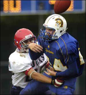 Blue Devil defender Dylan Warner breaks up a pass to Maine-Endwell's Greg Fedorachak in the first quarter of the game at M-E. 