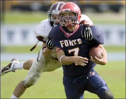 Corning East's Cameron Flory comes from behind to tackle Chenango Forks' Bryan Lance in the third quarter of Saturday's game at Chenango Forks 