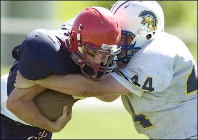 Nathan Reynolds of Maine-Endwell puts the stop on Jake Reynolds of Chenango Forks in the third quarter